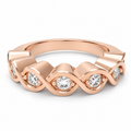 ELVORIQUE seven-stone wave diamond band with 0.32 ct total weight of round brilliant lab-grown diamonds in polished rose gold